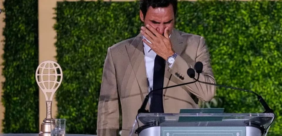 Roger Federer speaking emotionally at an event