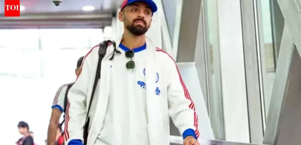 Player walking through airport terminal with luggage