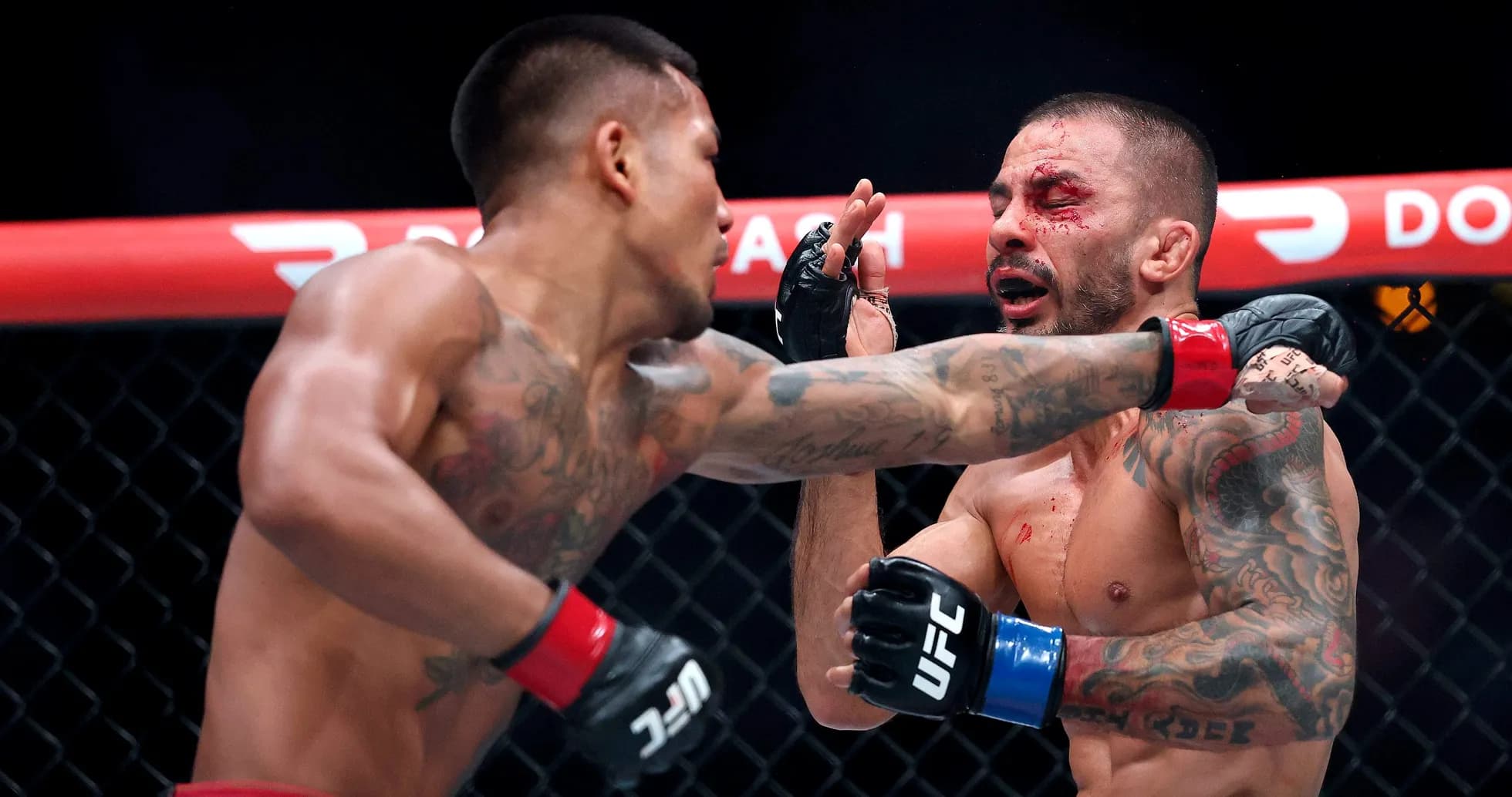 Fighter landing a punch in MMA match