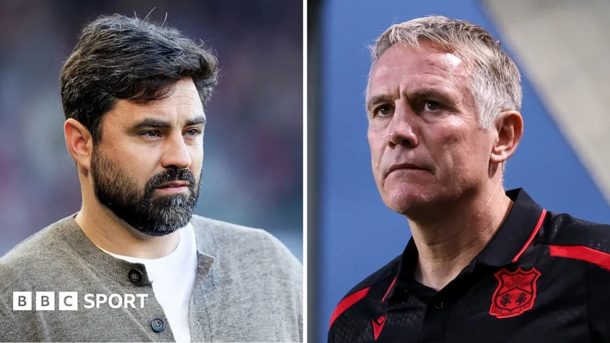 Two football managers during a match discussion