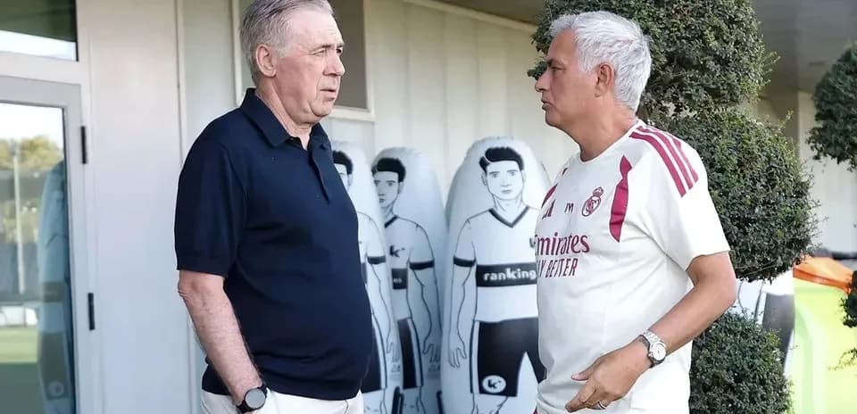 Carlo Ancelotti and José Mourinho talking outside