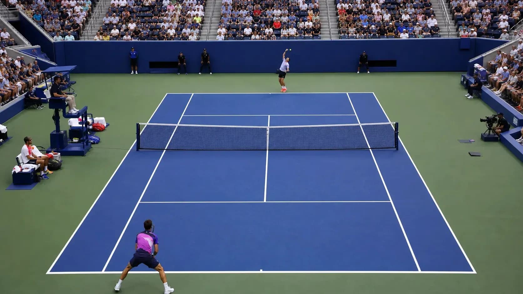 Player serving during a tennis match at stadium Player serving during a tennis match at stadium