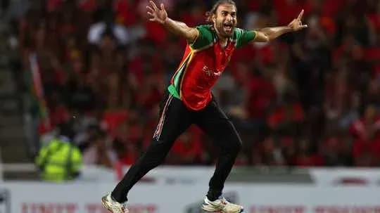 Cricketer celebrating a wicket during match Cricketer celebrating a wicket during match