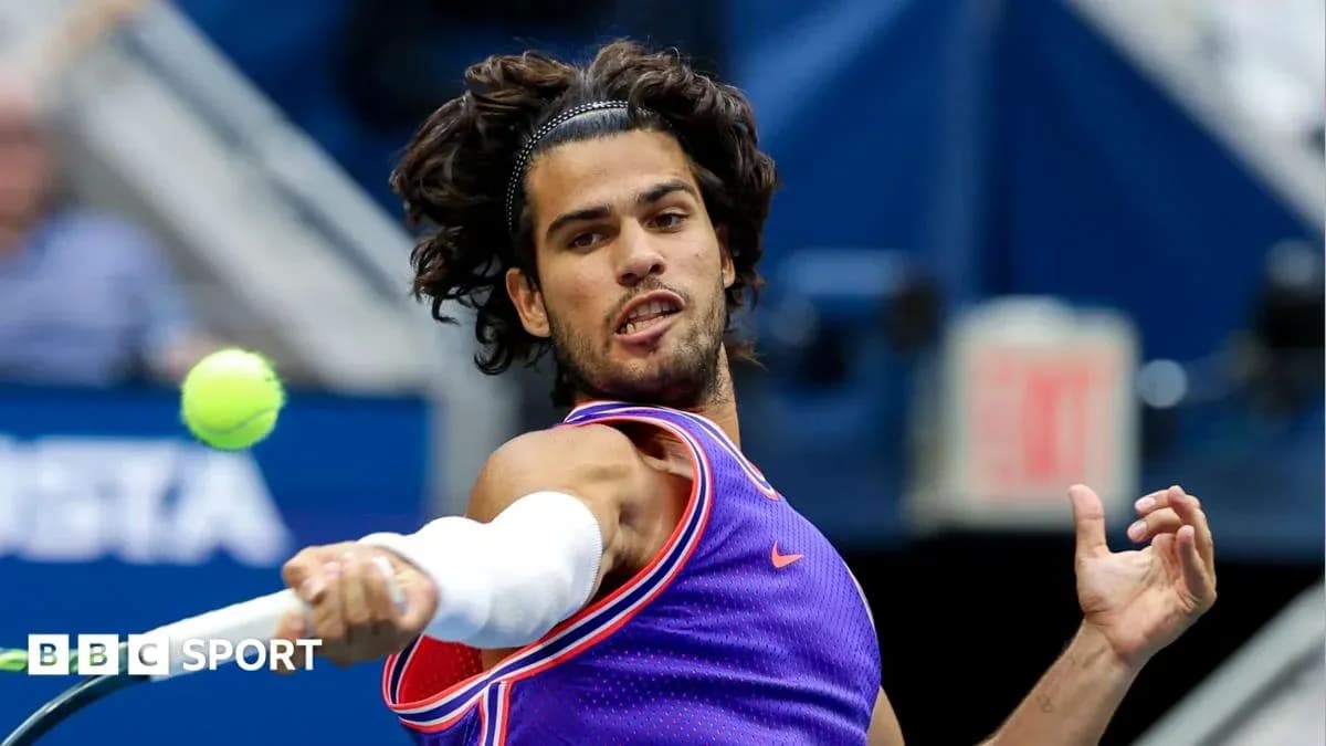 Player hitting a tennis ball during a match Player hitting a tennis ball during a match