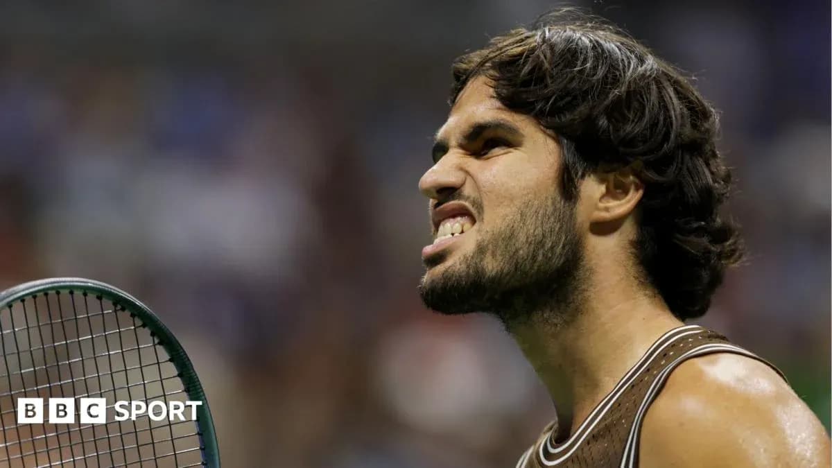 Tennis player celebrating with racket on court Tennis player celebrating with racket on court