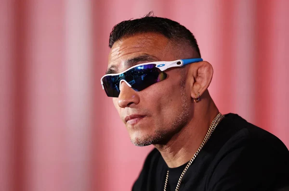 Fighter wearing sunglasses during press conference Fighter wearing sunglasses during press conference