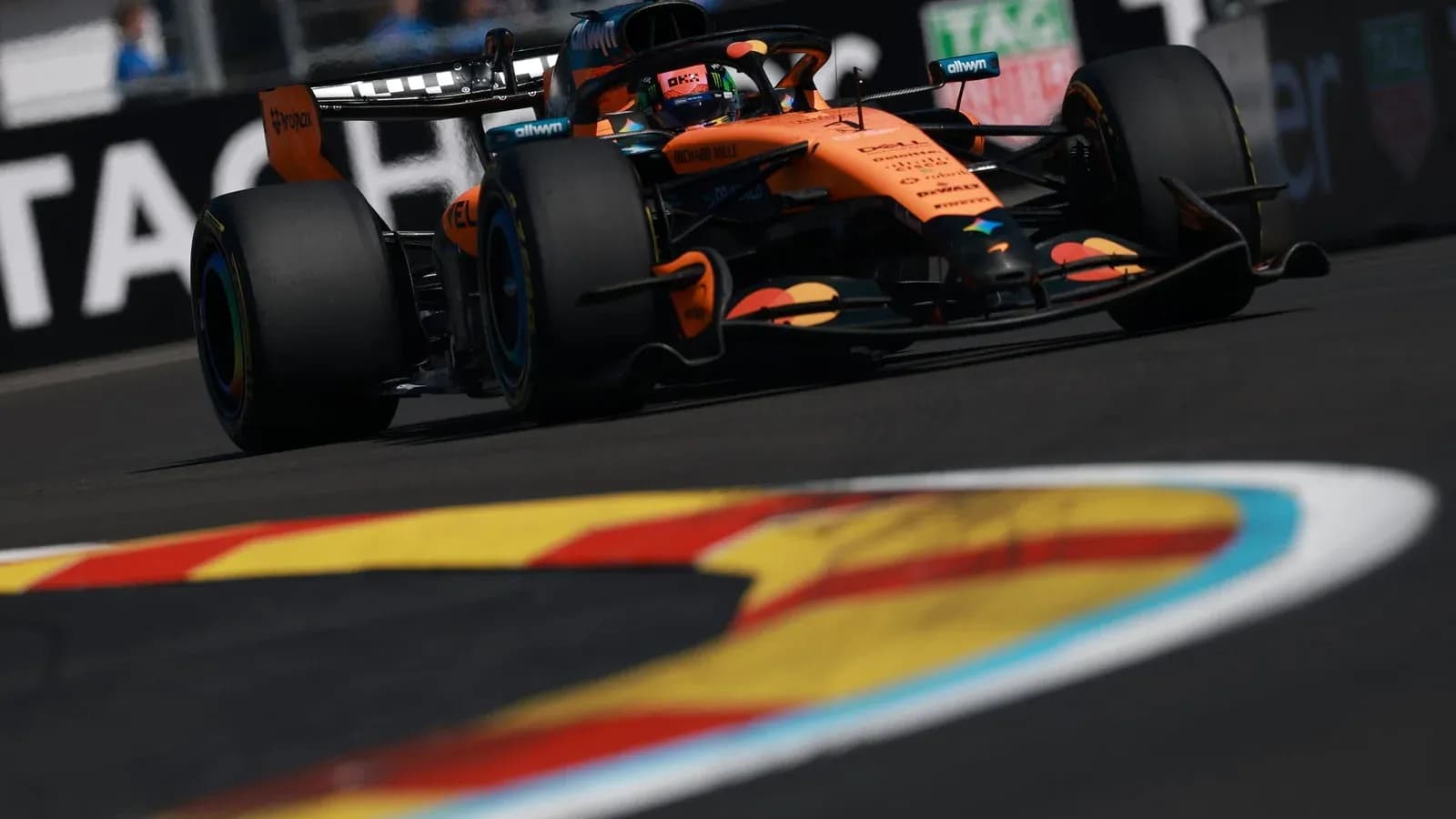 McLaren racing car on track during Formula 1 event McLaren racing car on track during Formula 1 event
