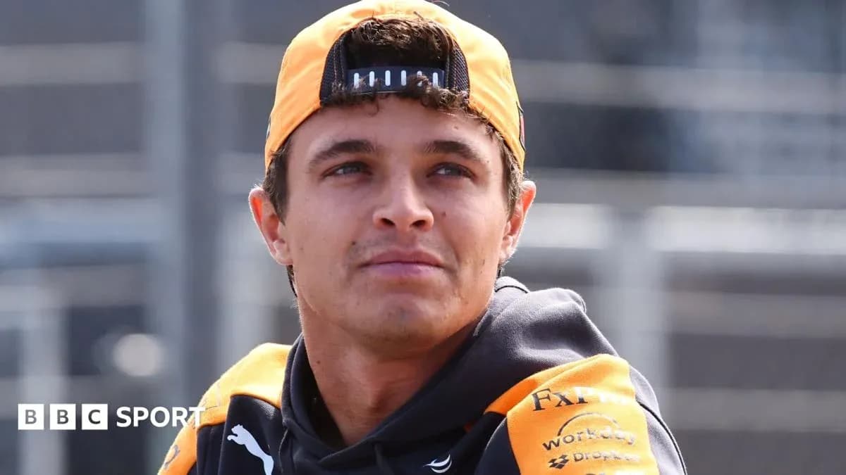 Driver in McLaren gear during a race event Driver in McLaren gear during a race event