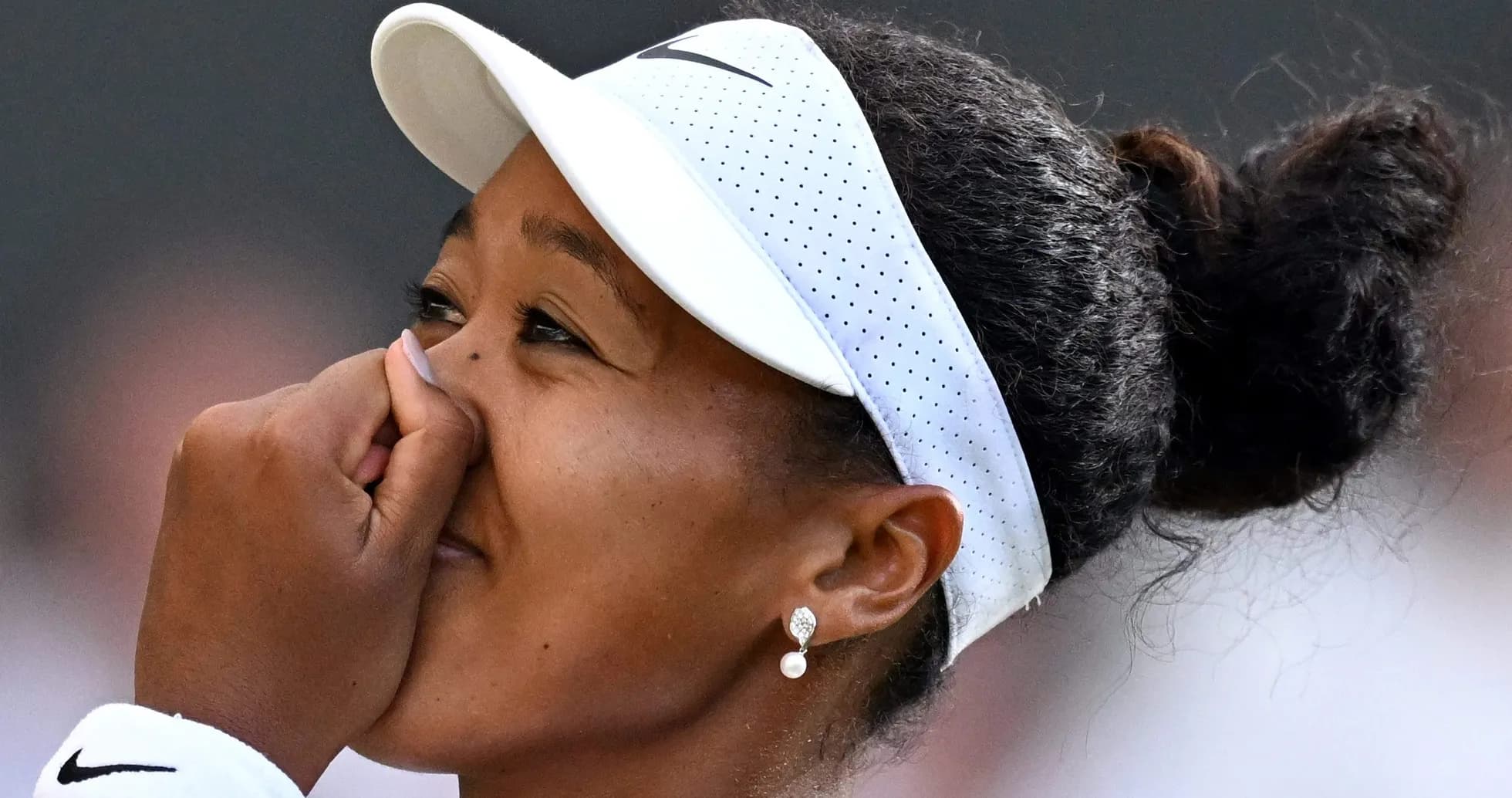 Naomi Osaka celebrating after winning a match Naomi Osaka celebrating after winning a match