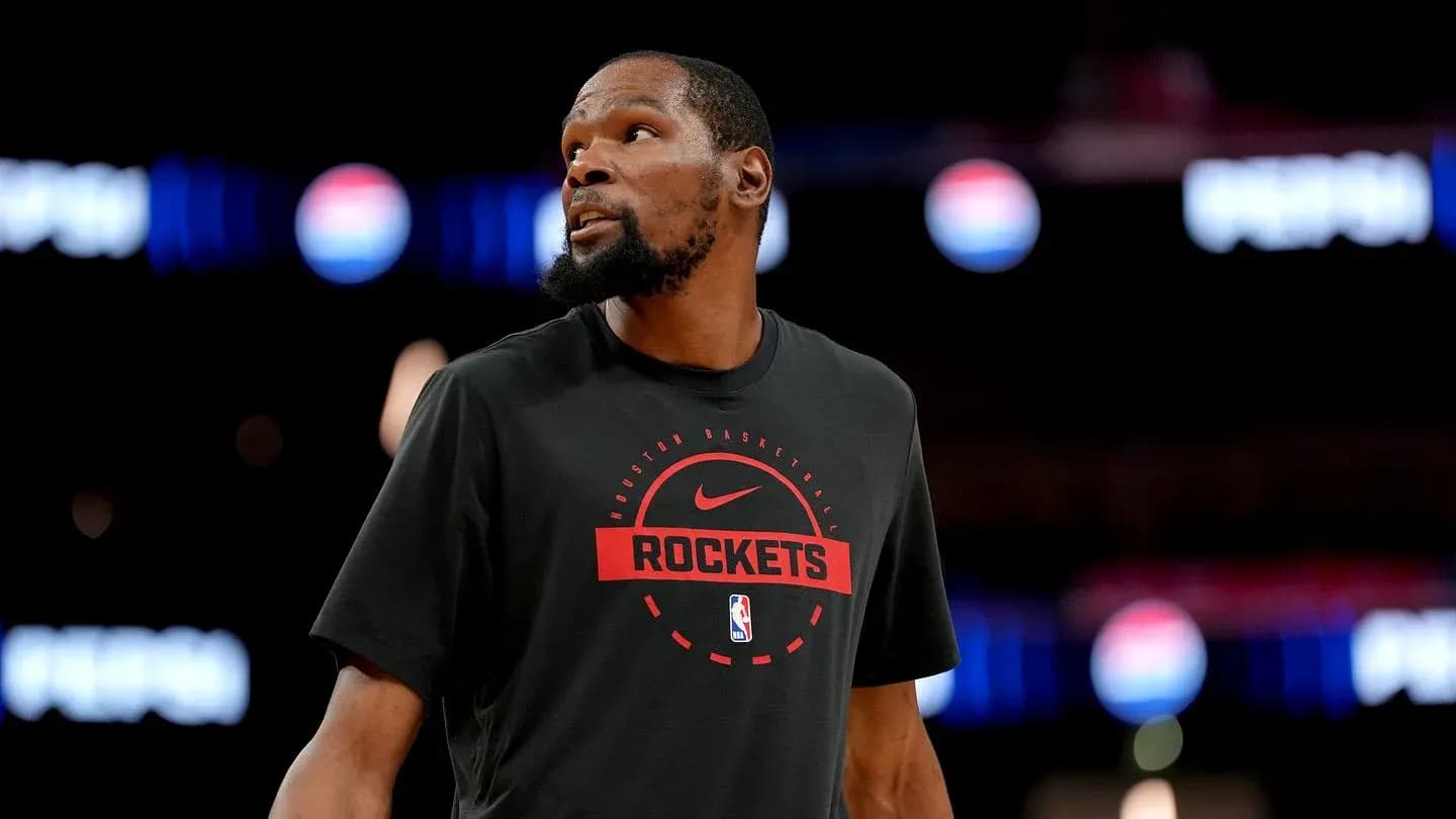 Player wearing Houston Rockets shirt on court Player wearing Houston Rockets shirt on court