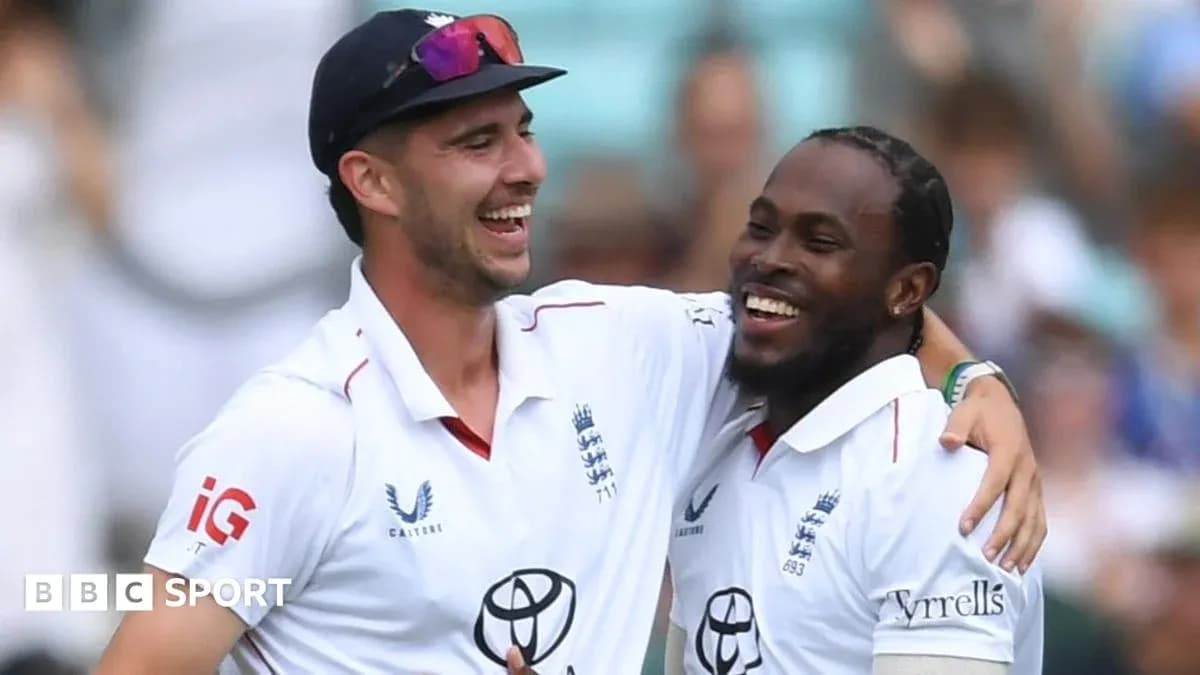Two England cricketers celebrating on the field Two England cricketers celebrating on the field