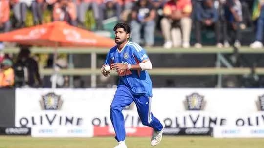 Bowler running on the field during cricket match Bowler running on the field during cricket match