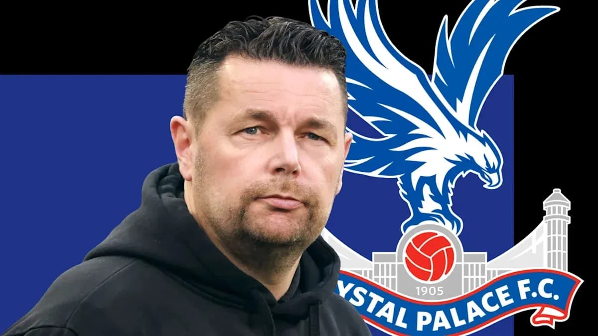 Coach in front of Crystal Palace FC logo Coach in front of Crystal Palace FC logo