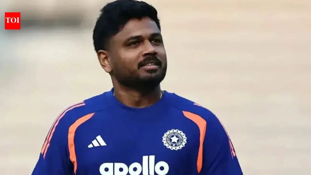 Cricketer wearing blue jersey during practice session Cricketer wearing blue jersey during practice session