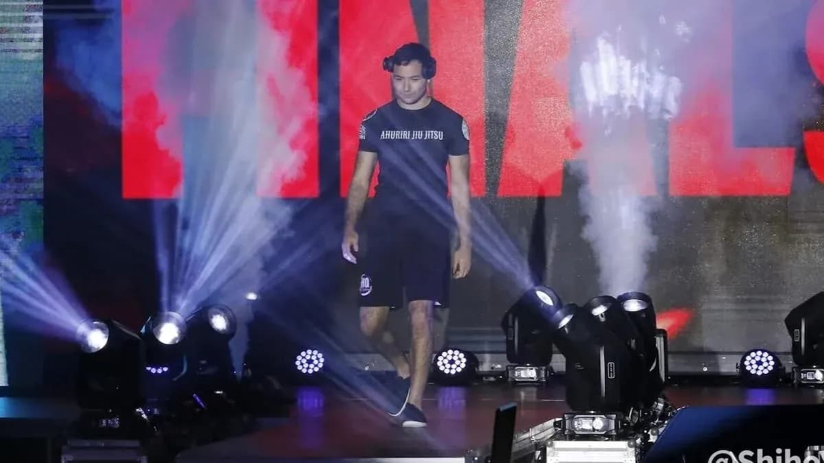 Athlete walking to the finals with stage lights Athlete walking to the finals with stage lights