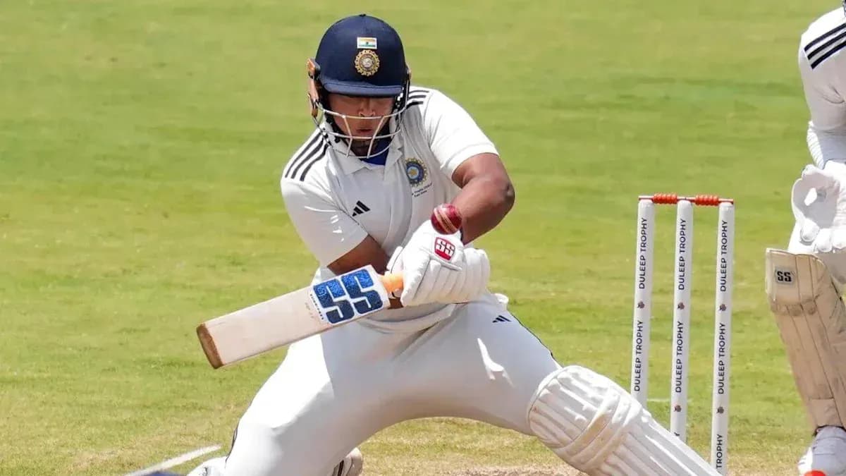 Batsman playing a shot in a cricket match Batsman playing a shot in a cricket match