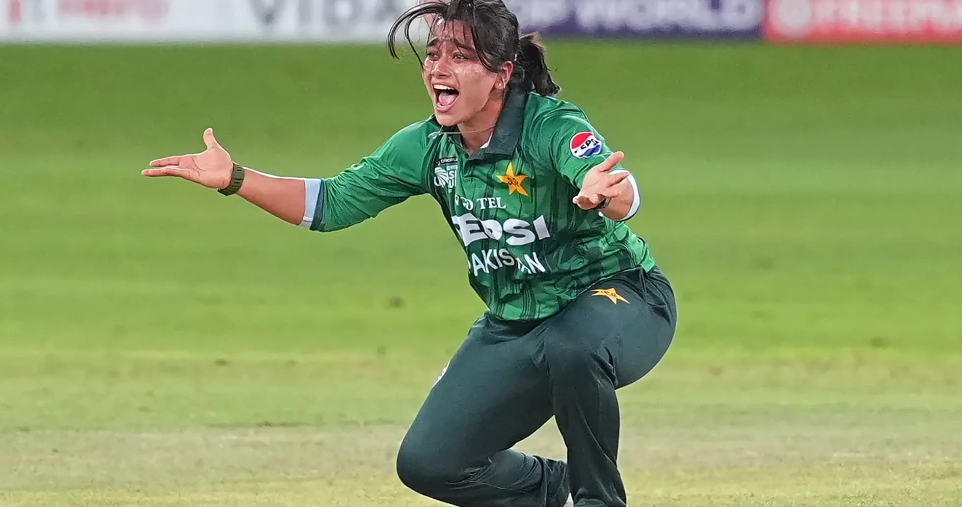 Cricketer celebrating a wicket during match Cricketer celebrating a wicket during match