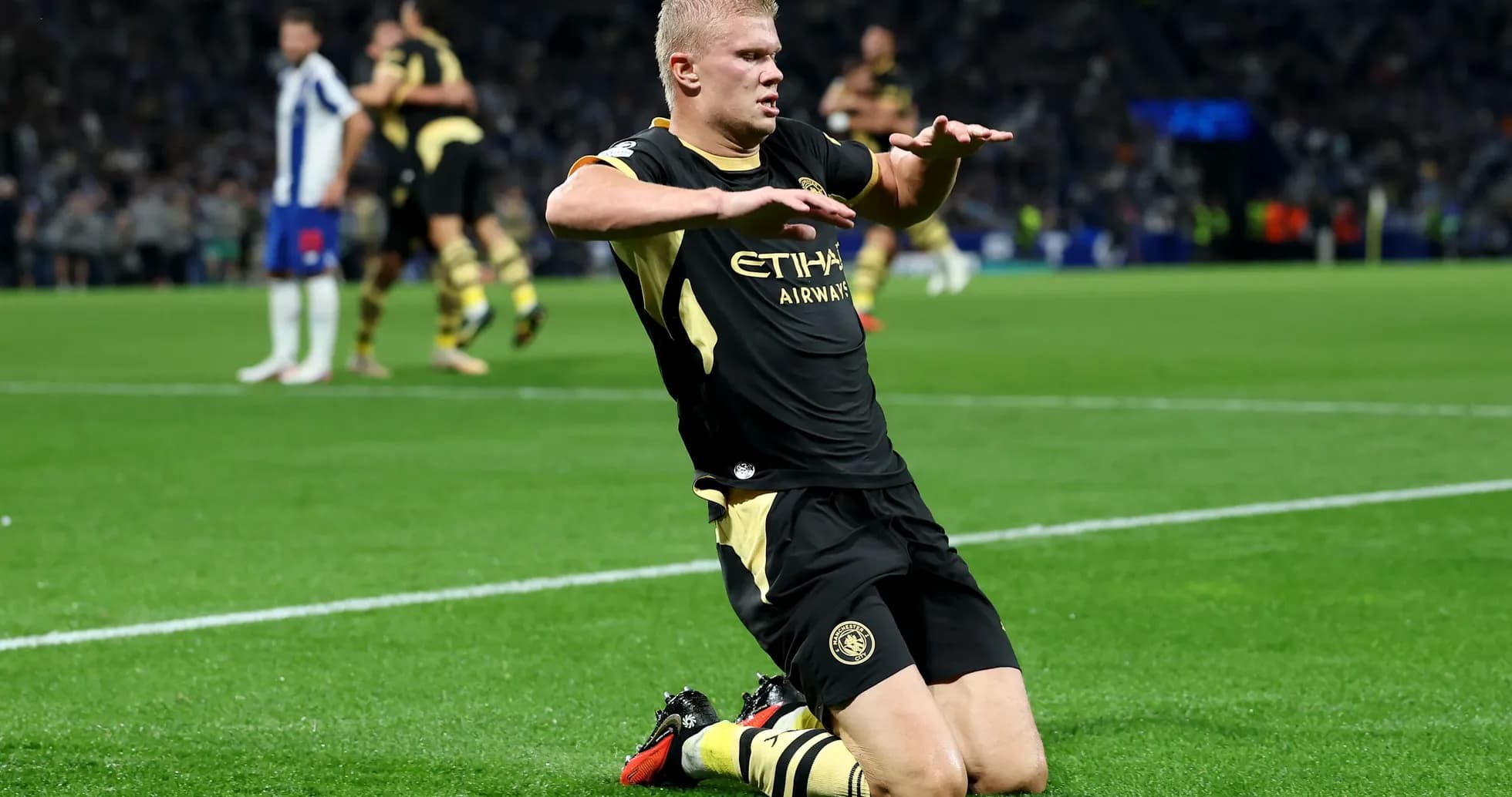 Player celebrating on the field after scoring goal Player celebrating on the field after scoring goal