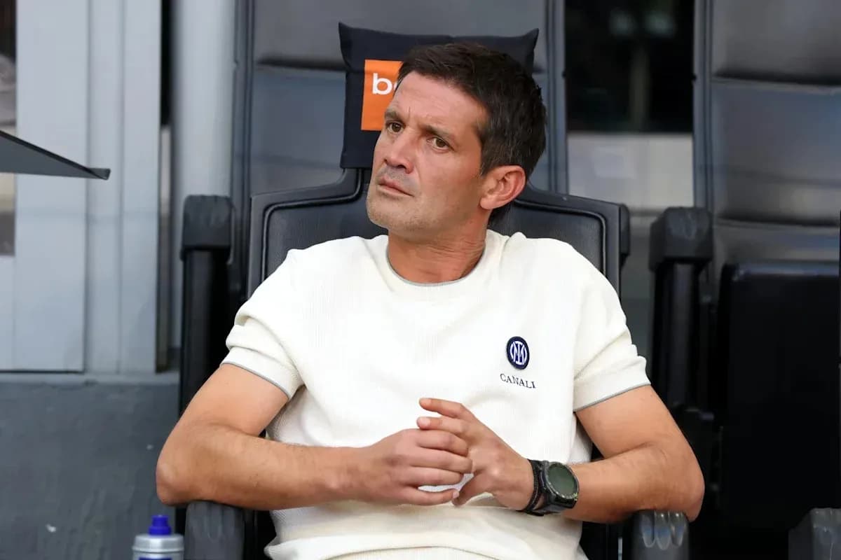 Manager sitting in the dugout during a match Manager sitting in the dugout during a match