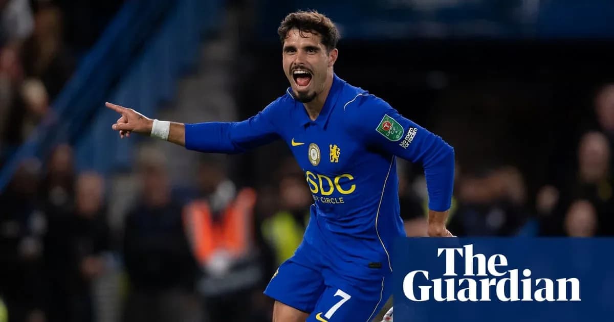Player celebrating in Chelsea's blue kit during match Player celebrating in Chelsea's blue kit during match