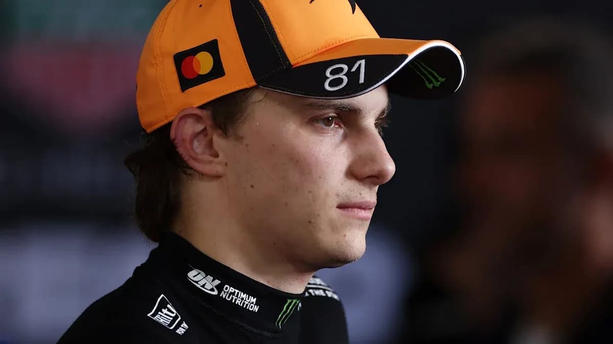 Racing driver wearing cap in interview setting Racing driver wearing cap in interview setting