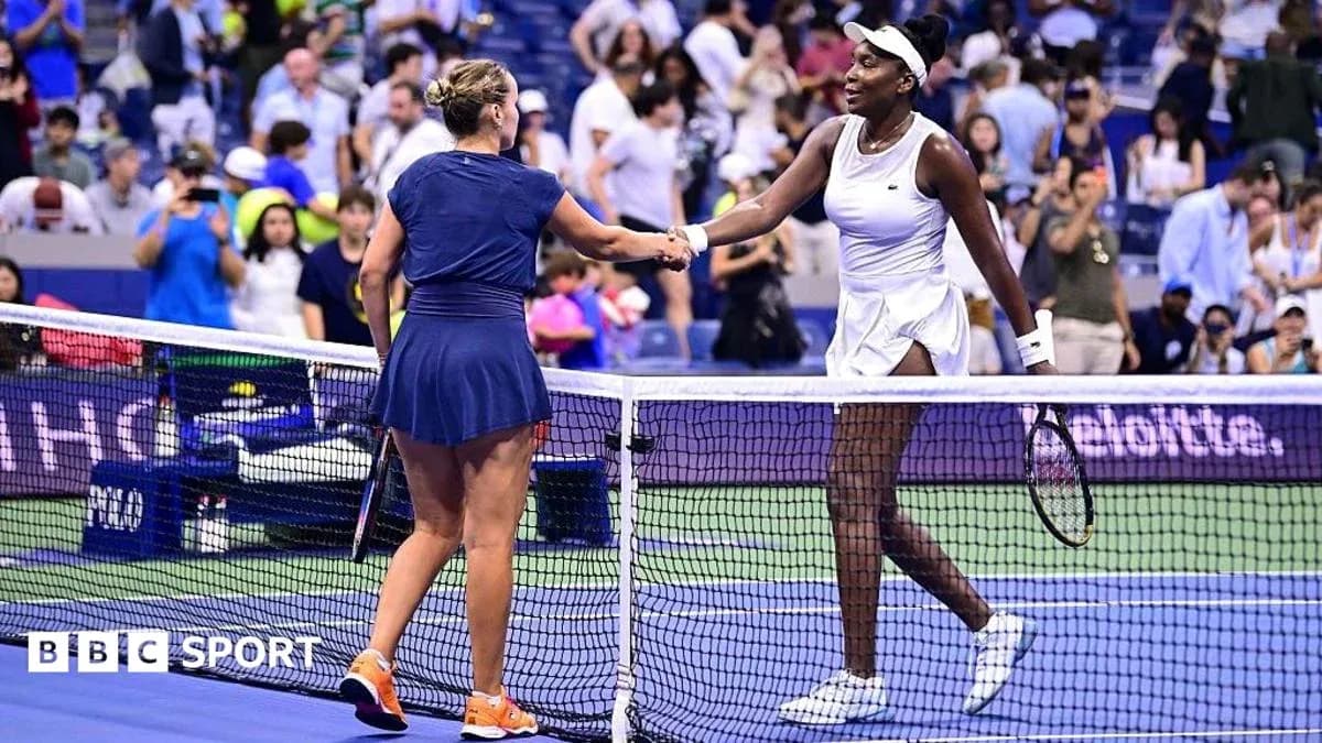 Two tennis players shaking hands at the net Two tennis players shaking hands at the net