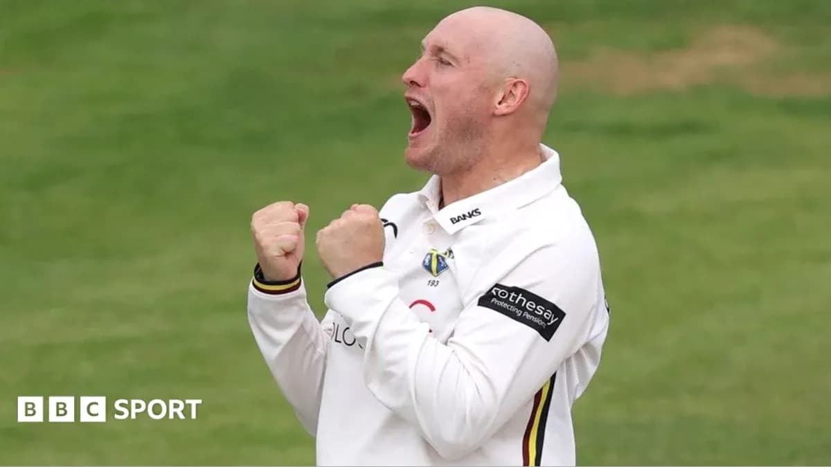 Cricketer celebrating after taking a wicket Cricketer celebrating after taking a wicket