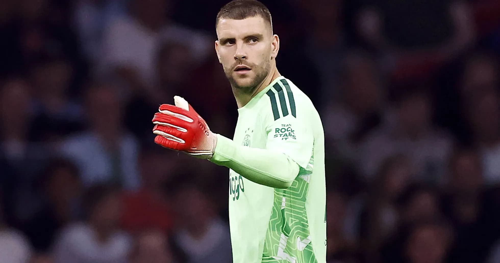 Goalkeeper gesturing during a soccer match Goalkeeper gesturing during a soccer match