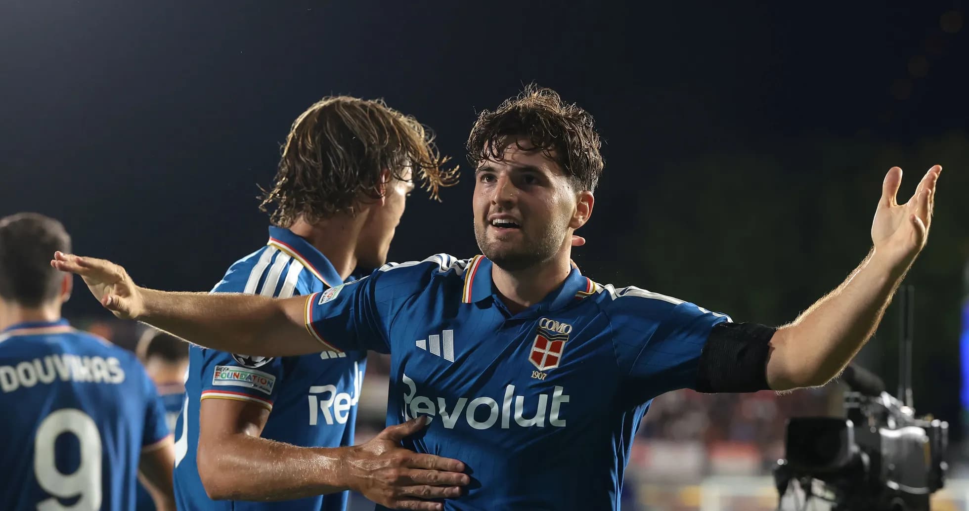 Players celebrating a goal during a match Players celebrating a goal during a match