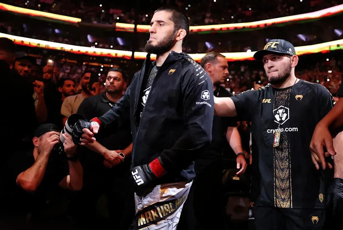 Fighter entering arena with team before match Fighter entering arena with team before match