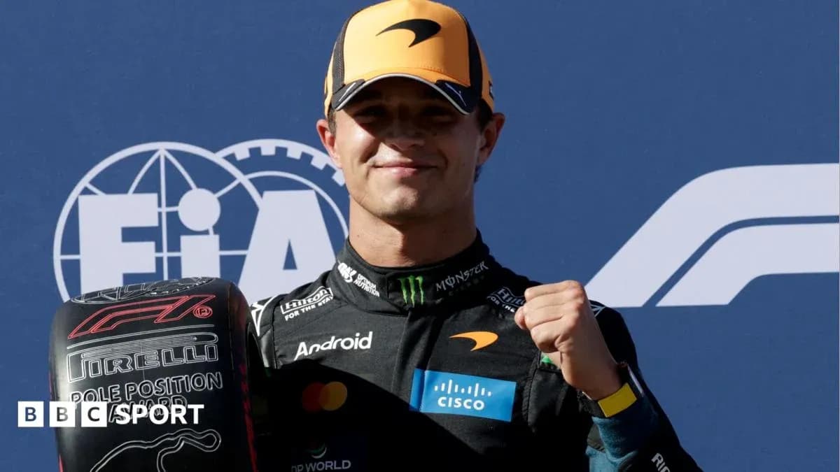Driver celebrating with pole position tire at event Driver celebrating with pole position tire at event