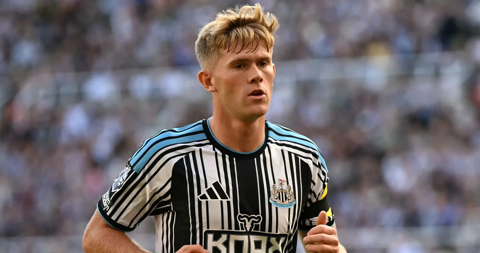 Newcastle United player running on the pitch Newcastle United player running on the pitch