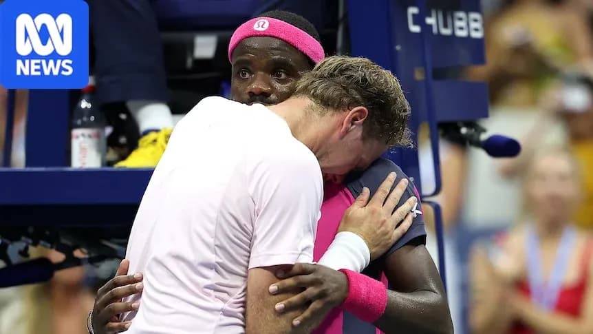 Players embracing during a tense moment at match Players embracing during a tense moment at match