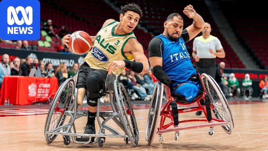 Two wheelchair basketball players competing for the ball Two wheelchair basketball players competing for the ball