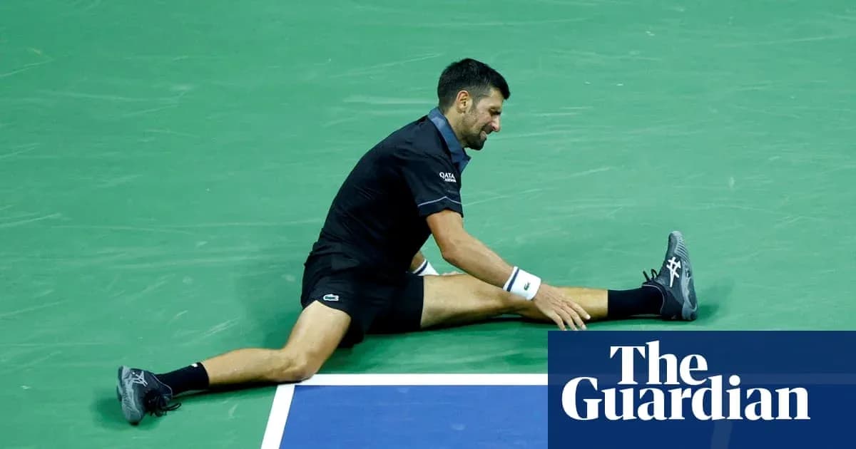 Novak Djokovic stretching on tennis court during match Novak Djokovic stretching on tennis court during match