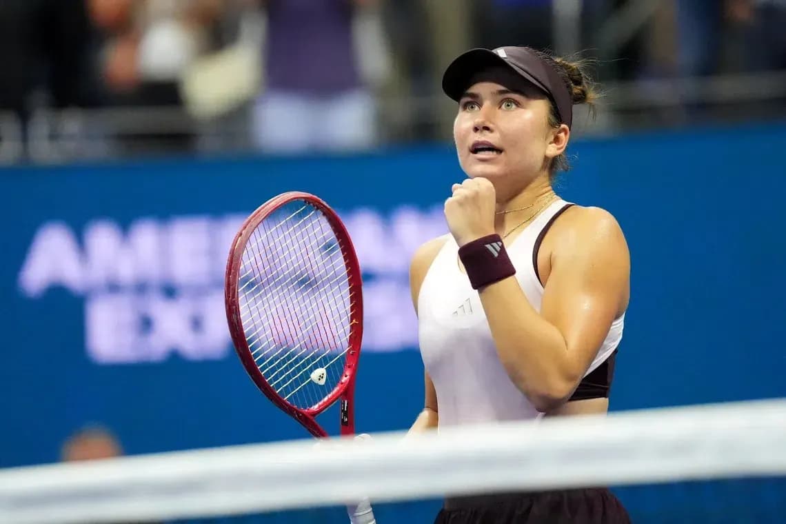 Tennis player celebrating victory during match Tennis player celebrating victory during match