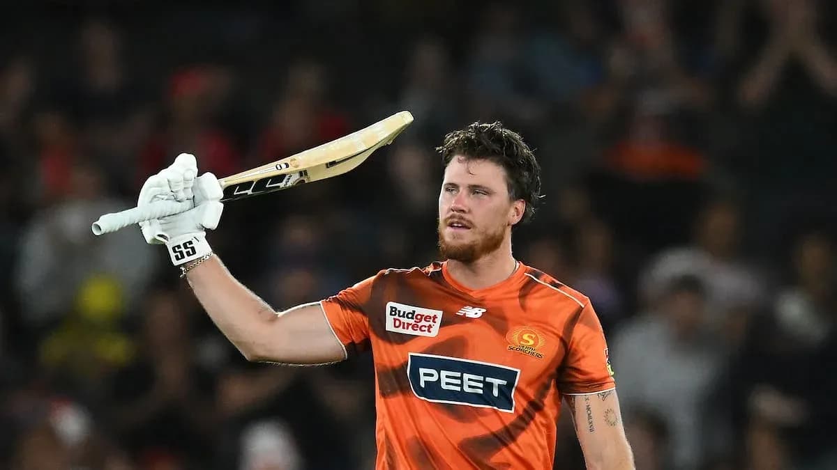 Batter celebrating with bat after scoring runs Batter celebrating with bat after scoring runs
