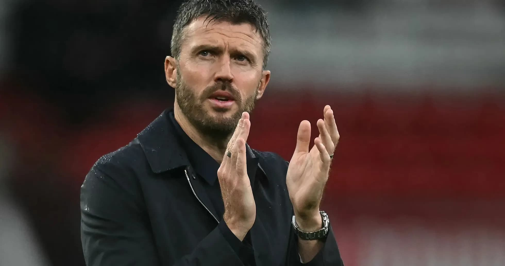 Coach applauding during a football match Coach applauding during a football match