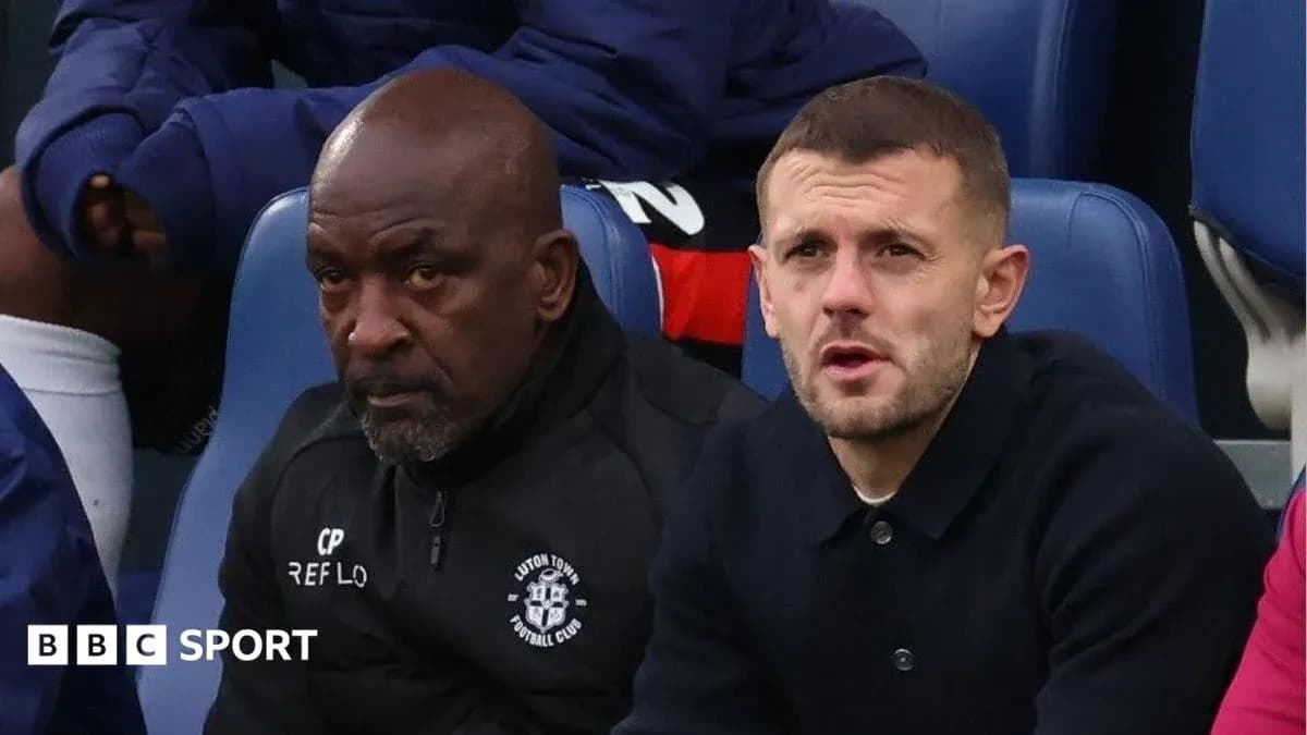 Two men sitting on bench during match Two men sitting on bench during match