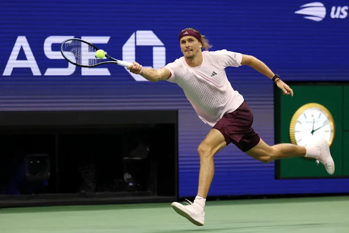 Player reaching for a tennis ball during match Player reaching for a tennis ball during match