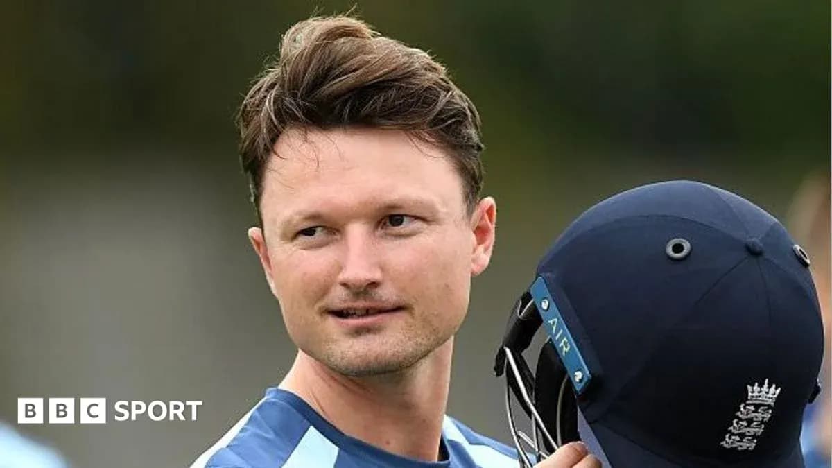 Cricketer holding helmet during training session Cricketer holding helmet during training session