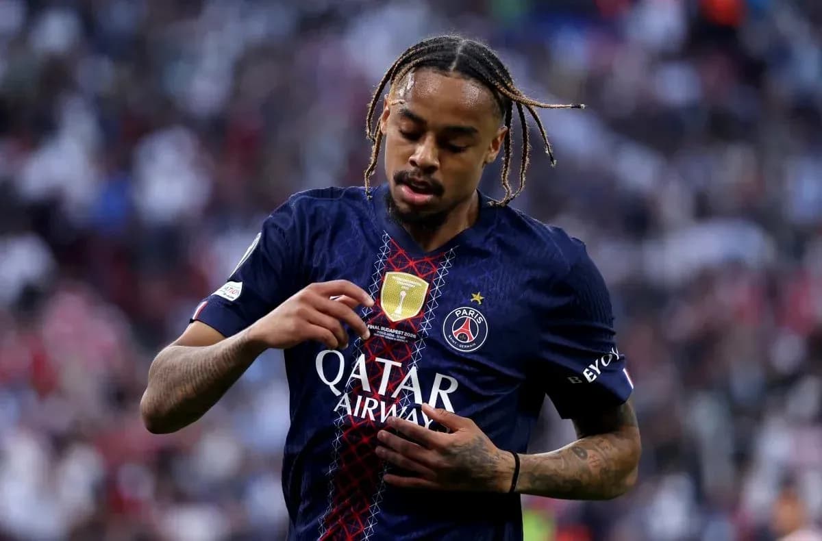 Player adjusting jersey during match for PSG Player adjusting jersey during match for PSG