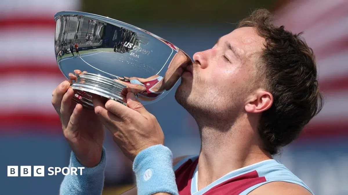 Player kissing US Open trophy after victory Player kissing US Open trophy after victory