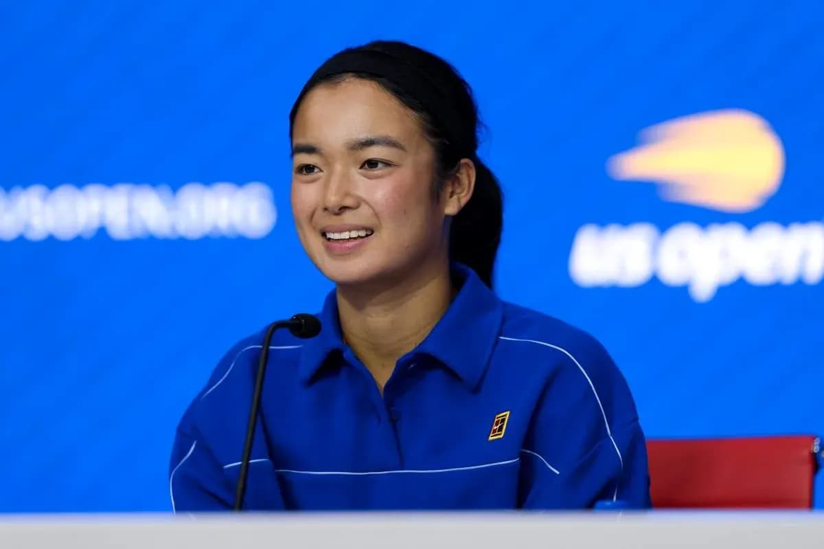 Player at press conference with blue background Player at press conference with blue background