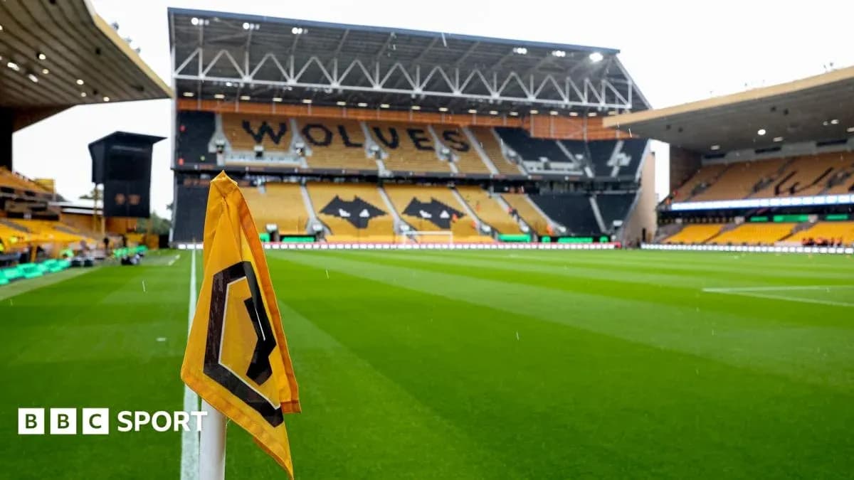 Wolverhampton stadium with corner flag in focus Wolverhampton stadium with corner flag in focus