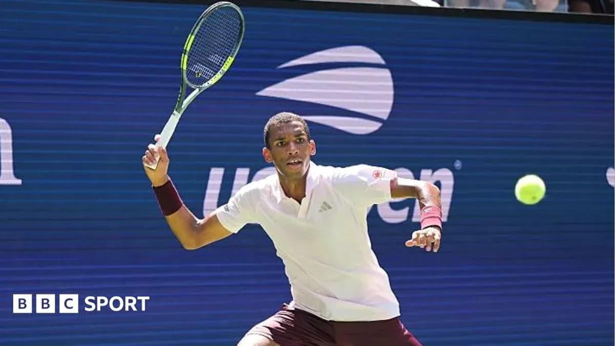 Player hitting a forehand during tennis match Player hitting a forehand during tennis match