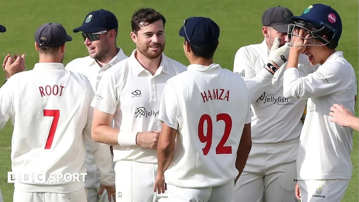 Cricket players celebrating a wicket on field Cricket players celebrating a wicket on field