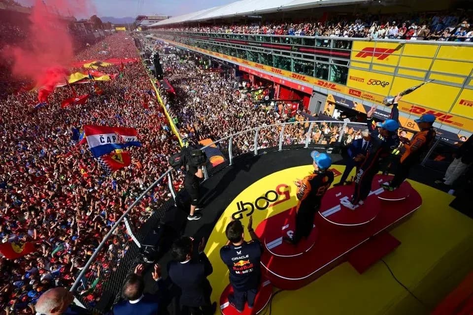 Podium celebration with drivers and cheering crowd Podium celebration with drivers and cheering crowd