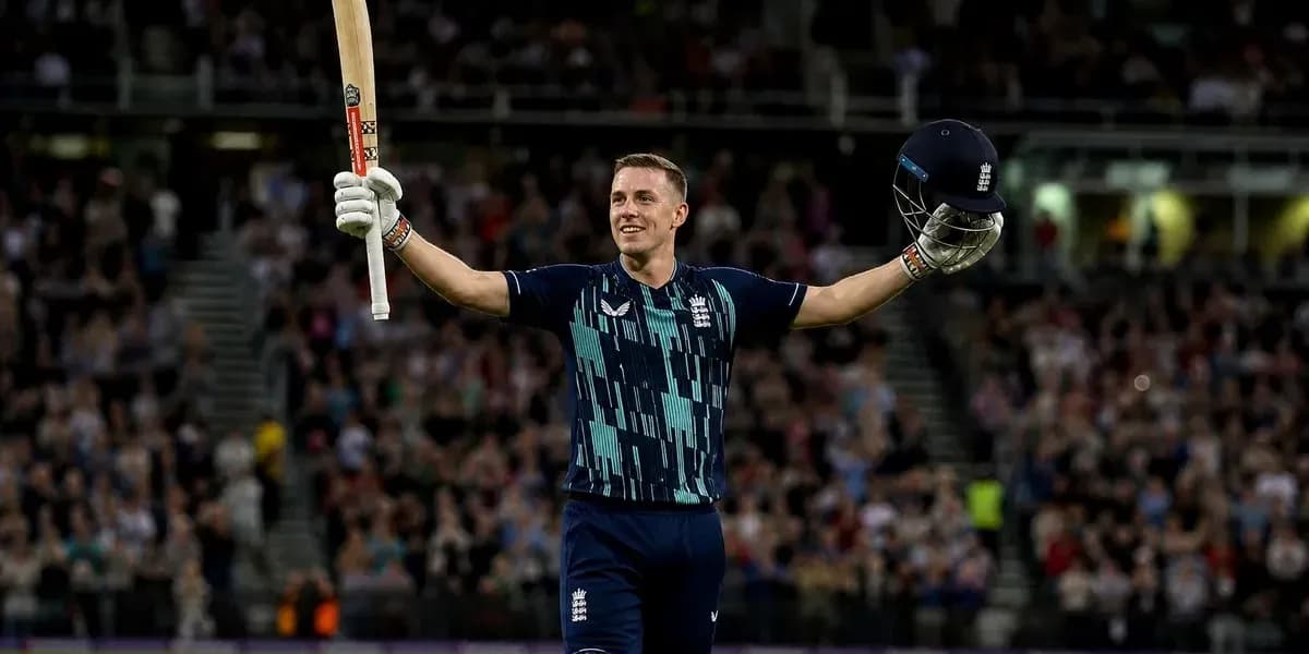 Batsman celebrating with bat and helmet raised Batsman celebrating with bat and helmet raised