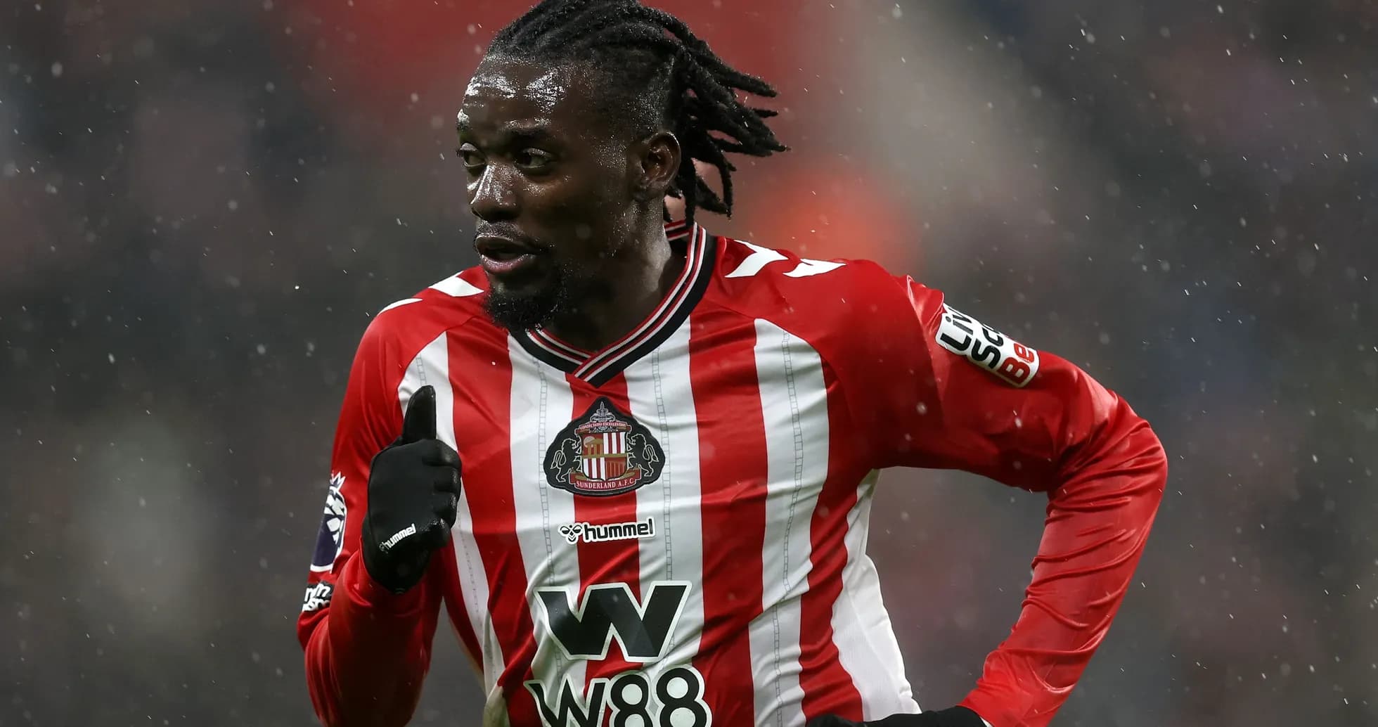 Player in Sunderland kit running during match Player in Sunderland kit running during match